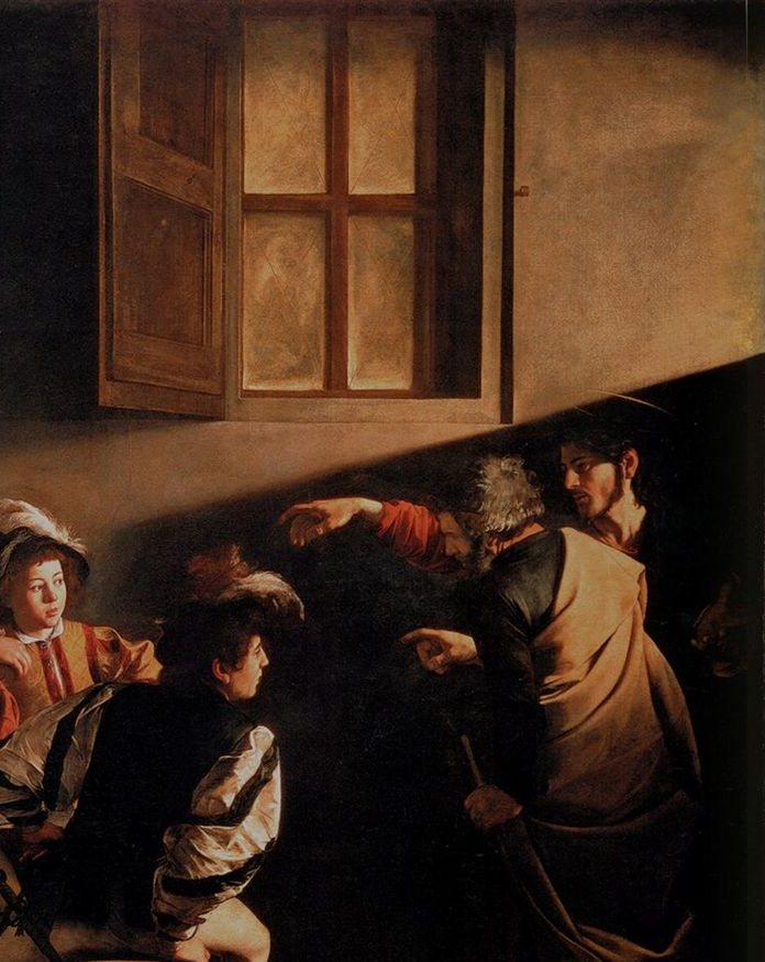 Detail of Caravaggio's Calling of Saint Matthew: beneath a half-shuttered window, a beam of light slants across the dark wall from the upper right, past Christ's pointing hand, toward the seated group.