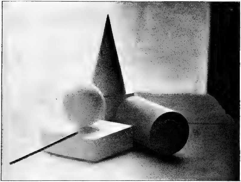 Cross's photograph of the white group lit from in front of the camera: the near faces of the cone, sphere and cylinder are in shadow, with light on their tops and edges and cast shadows running toward the viewer.